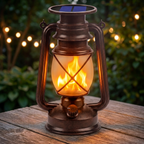 Nireza Solar Flame Lantern on a patio table at dusk